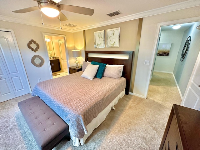 carpeted bedroom with ensuite bathroom, crown molding, and ceiling fan