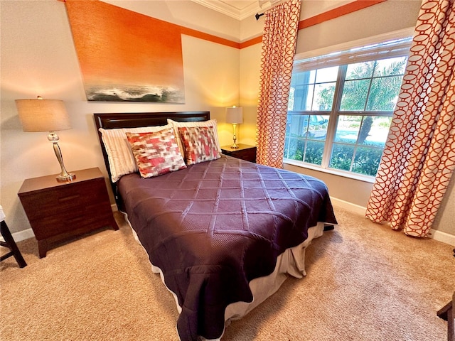 bedroom featuring carpet and crown molding