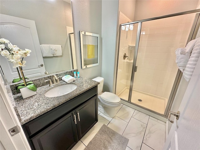 bathroom featuring vanity, tile patterned floors, walk in shower, and toilet