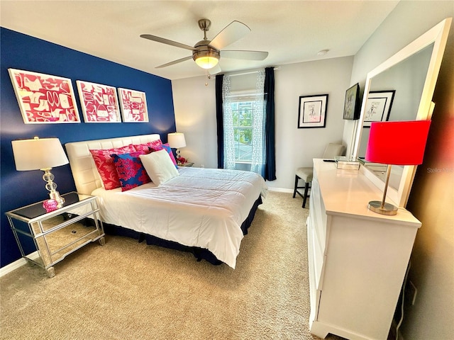 bedroom featuring ceiling fan and carpet flooring