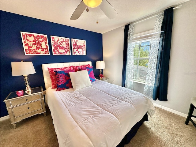 carpeted bedroom featuring ceiling fan