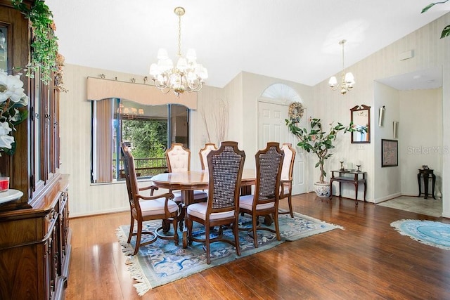 dining area featuring an inviting chandelier and wood-type flooring