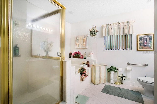 bathroom with tile patterned flooring, independent shower and bath, and toilet