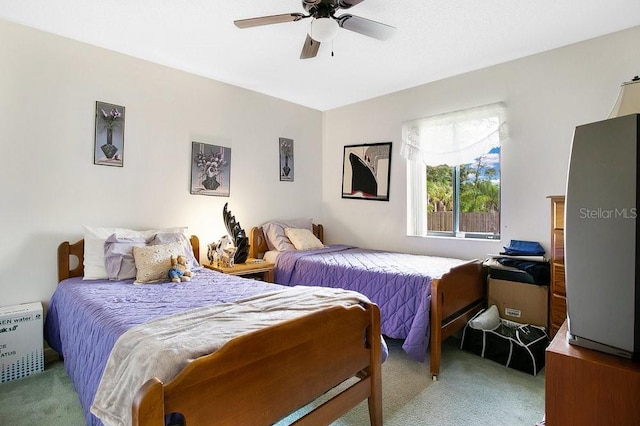 bedroom with carpet flooring and ceiling fan