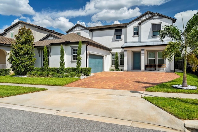 view of front of property with a porch and a front yard