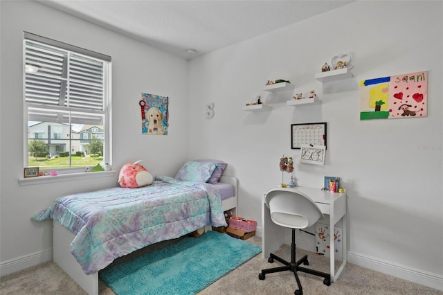 bedroom with light carpet