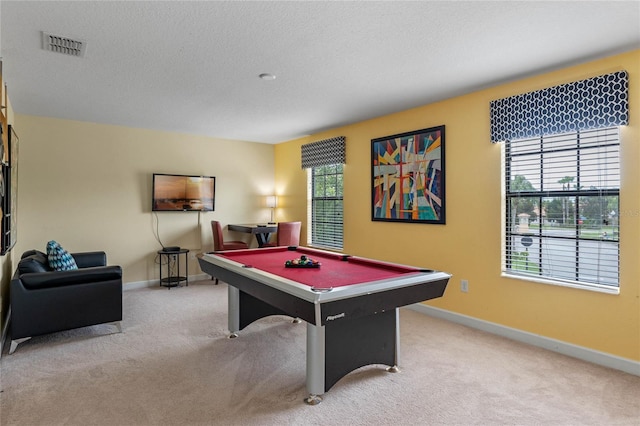 recreation room with light colored carpet and billiards