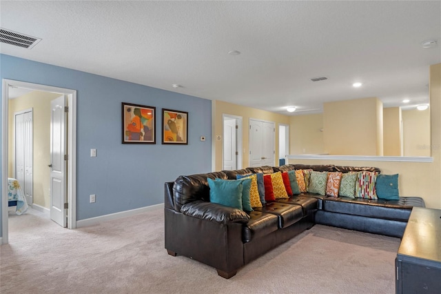 living room featuring light carpet