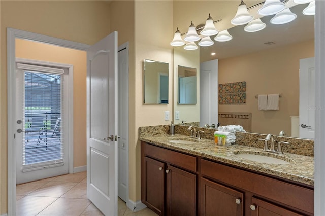 bathroom featuring tile patterned floors and vanity