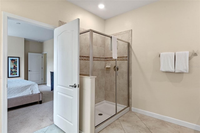 bathroom featuring tile patterned flooring and walk in shower