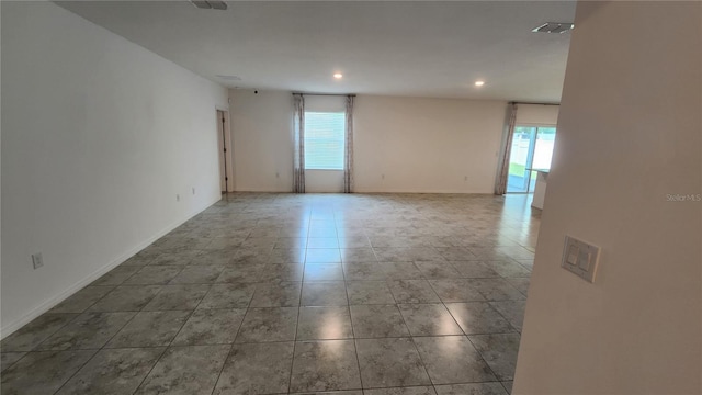 view of tiled spare room