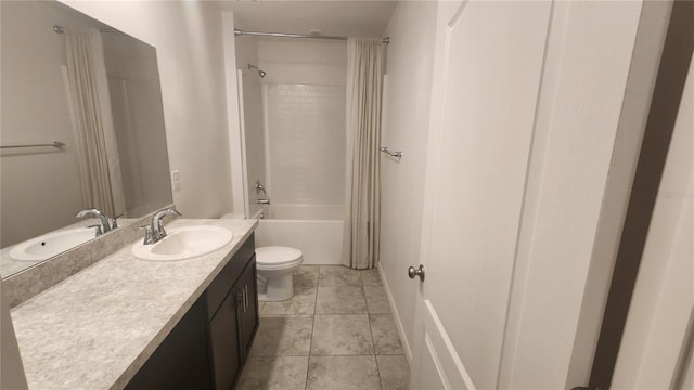 full bathroom with tile patterned flooring, toilet, bathing tub / shower combination, and vanity