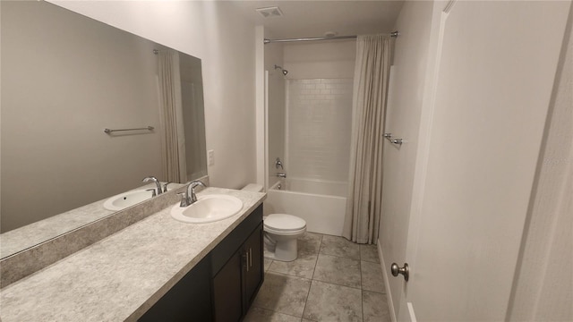 full bathroom featuring vanity, toilet,  shower combination, and tile patterned floors