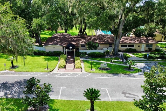 view of community featuring a yard