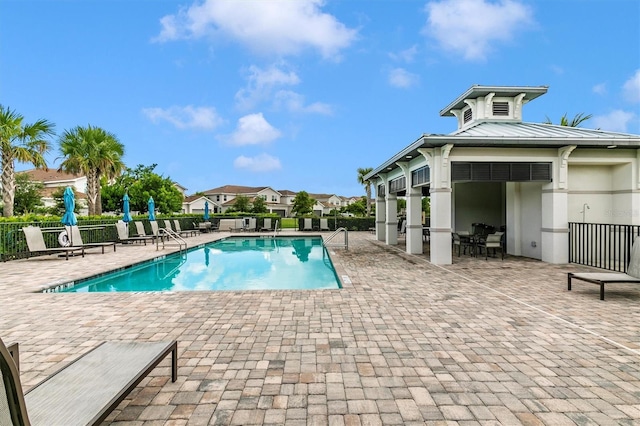 view of pool featuring a patio area