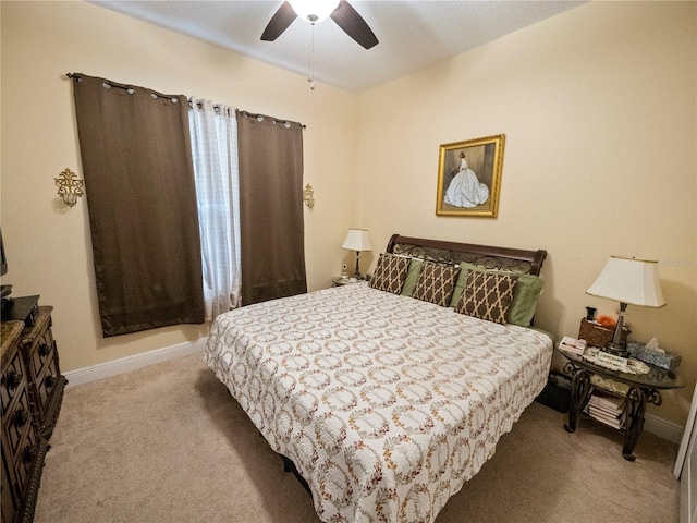 bedroom with ceiling fan and carpet floors