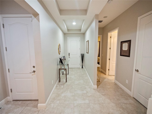 hallway with light tile patterned floors