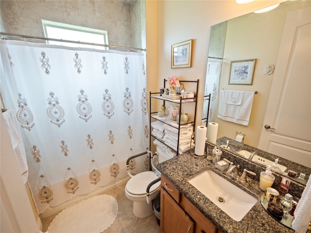 full bathroom with vanity, tile patterned flooring, toilet, and shower / tub combo with curtain