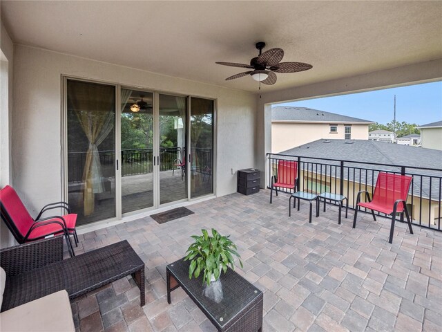 view of patio with ceiling fan