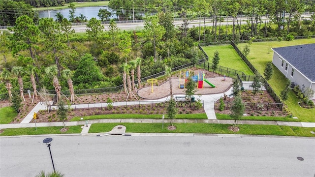 birds eye view of property featuring a water view