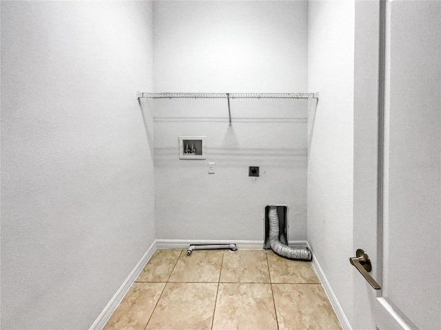 laundry room featuring washer hookup, light tile patterned flooring, and electric dryer hookup