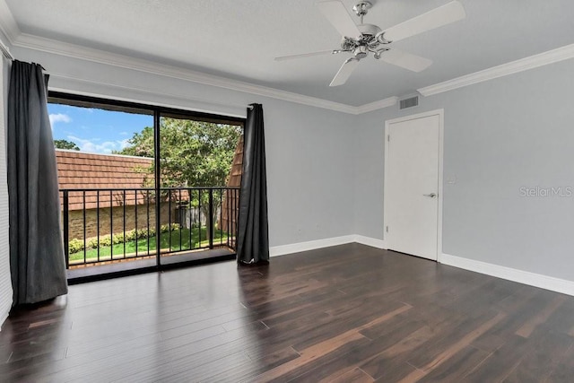 spare room featuring crown molding, ceiling fan, and dark hardwood / wood-style flooring