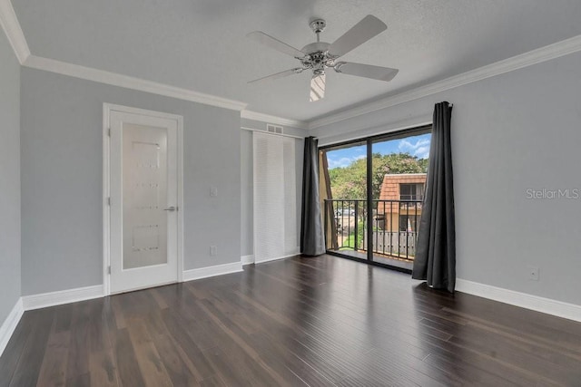 unfurnished room featuring dark hardwood / wood-style flooring, a textured ceiling, ornamental molding, and ceiling fan