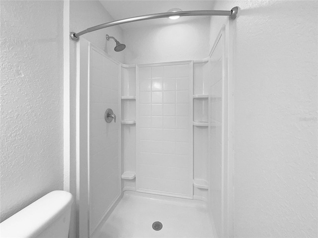 bathroom featuring walk in shower