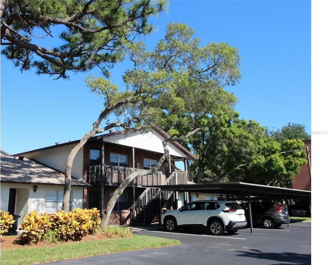 view of car parking featuring a carport