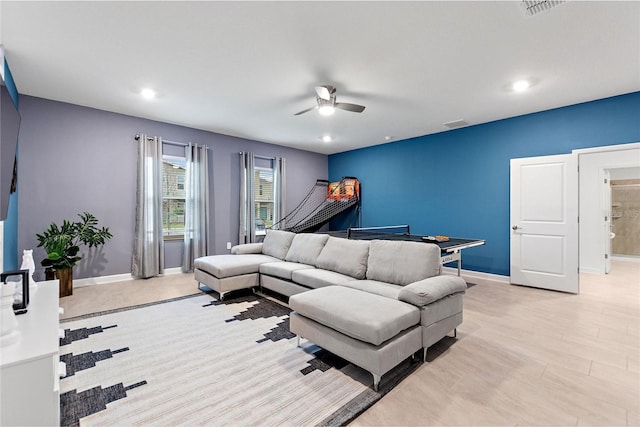 living room with ceiling fan