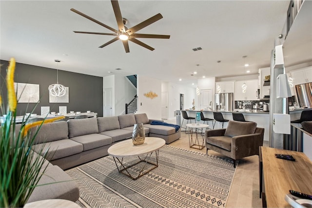 living room with ceiling fan