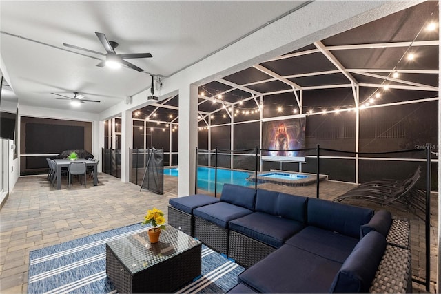 view of patio / terrace with an outdoor living space and ceiling fan