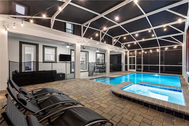 view of swimming pool featuring ceiling fan