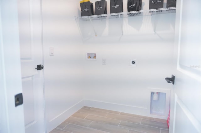 laundry area with electric dryer hookup and hookup for a washing machine