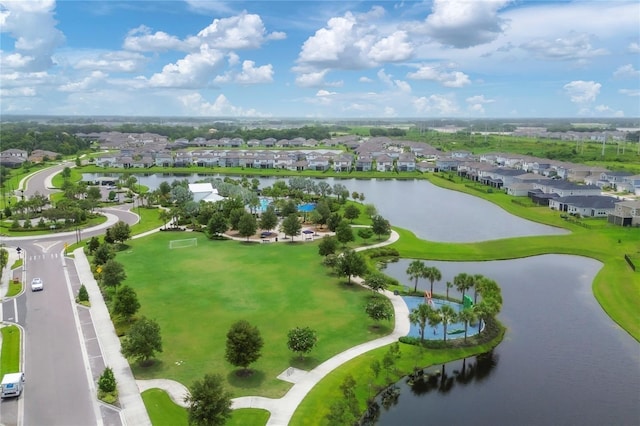 bird's eye view featuring a residential view and a water view