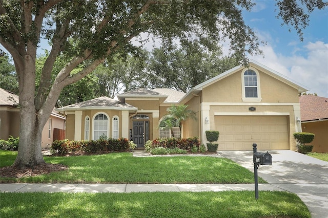 view of front facade with a front yard