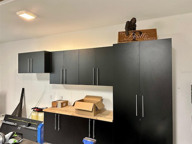 1077 Sugar Loaf Key Loop, Lady Lake, FL 32159 - kitchen with dark cabinetry