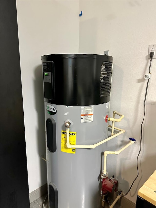 utility room with hybrid water heater