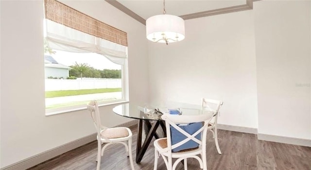 dining room with wood-type flooring