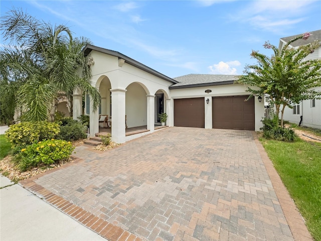 view of front of home with a garage