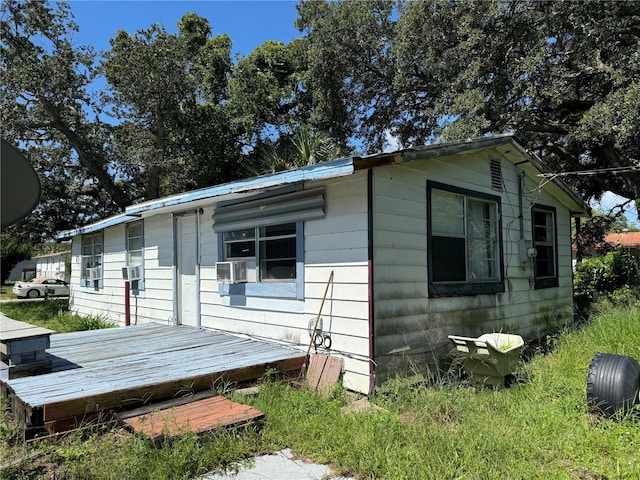 view of outbuilding featuring cooling unit