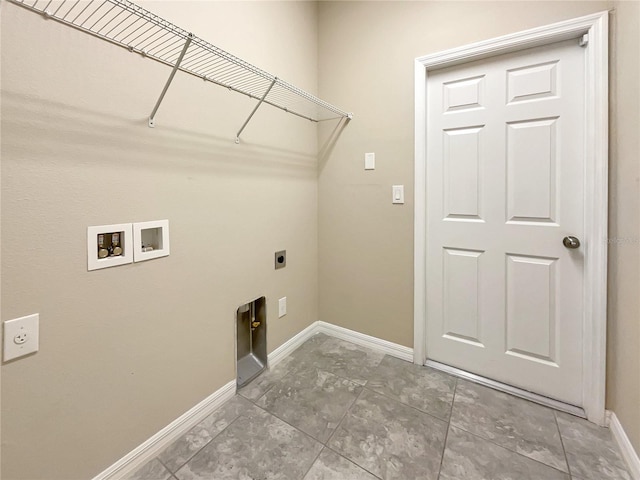 laundry room with hookup for a washing machine, hookup for an electric dryer, and tile patterned floors