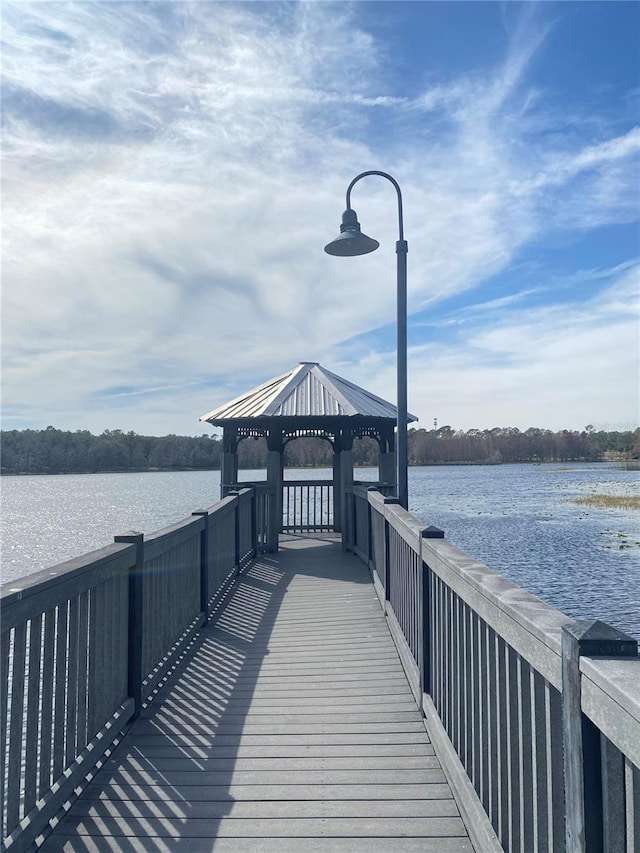 dock area featuring a gazebo and a water view