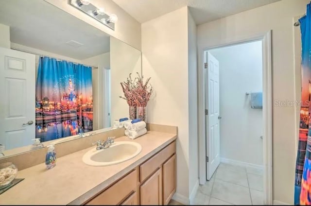 bathroom featuring vanity and tile patterned floors