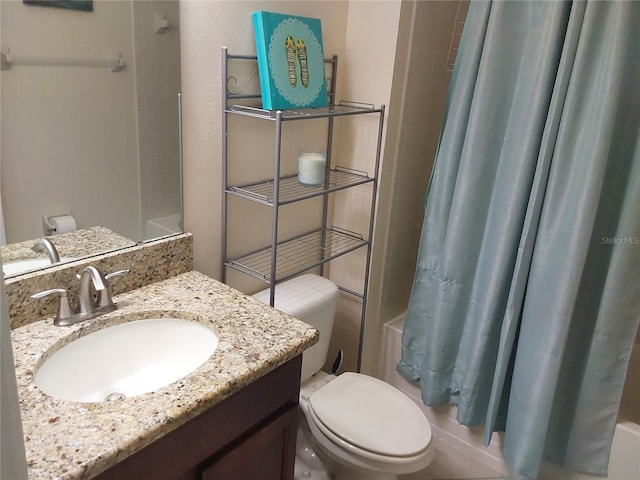 full bathroom featuring shower / bath combination with curtain, vanity, and toilet