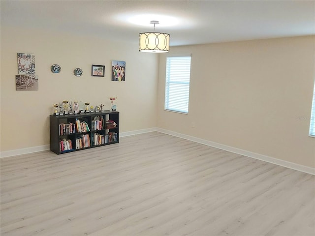 spare room with light wood-type flooring