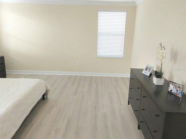 bedroom featuring light hardwood / wood-style flooring