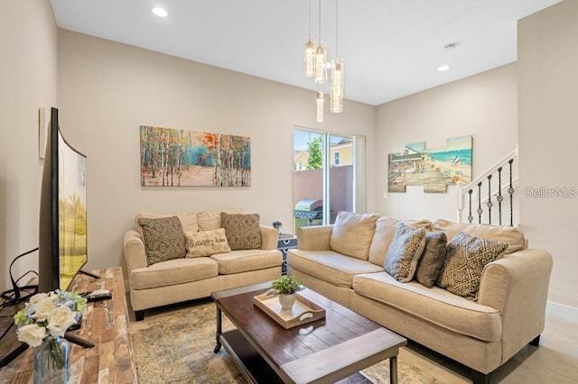 living room featuring an inviting chandelier