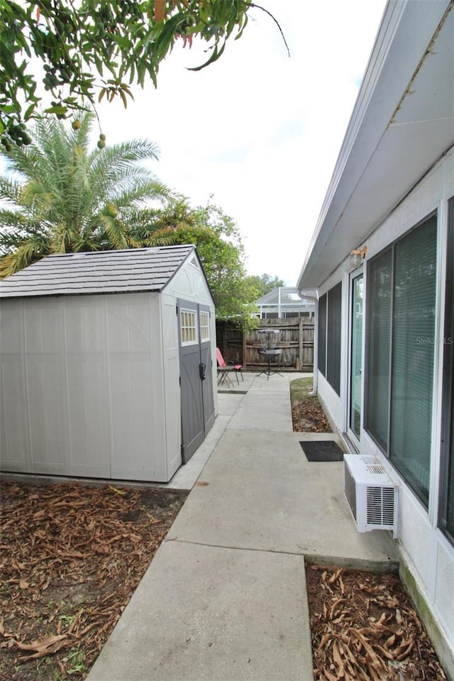 view of patio / terrace featuring a storage shed