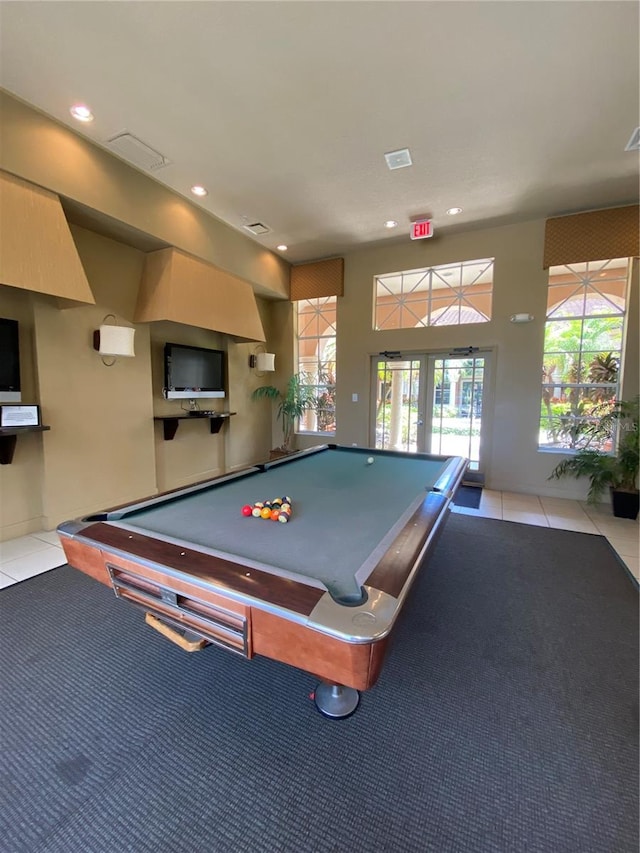 playroom with light colored carpet, billiards, and french doors